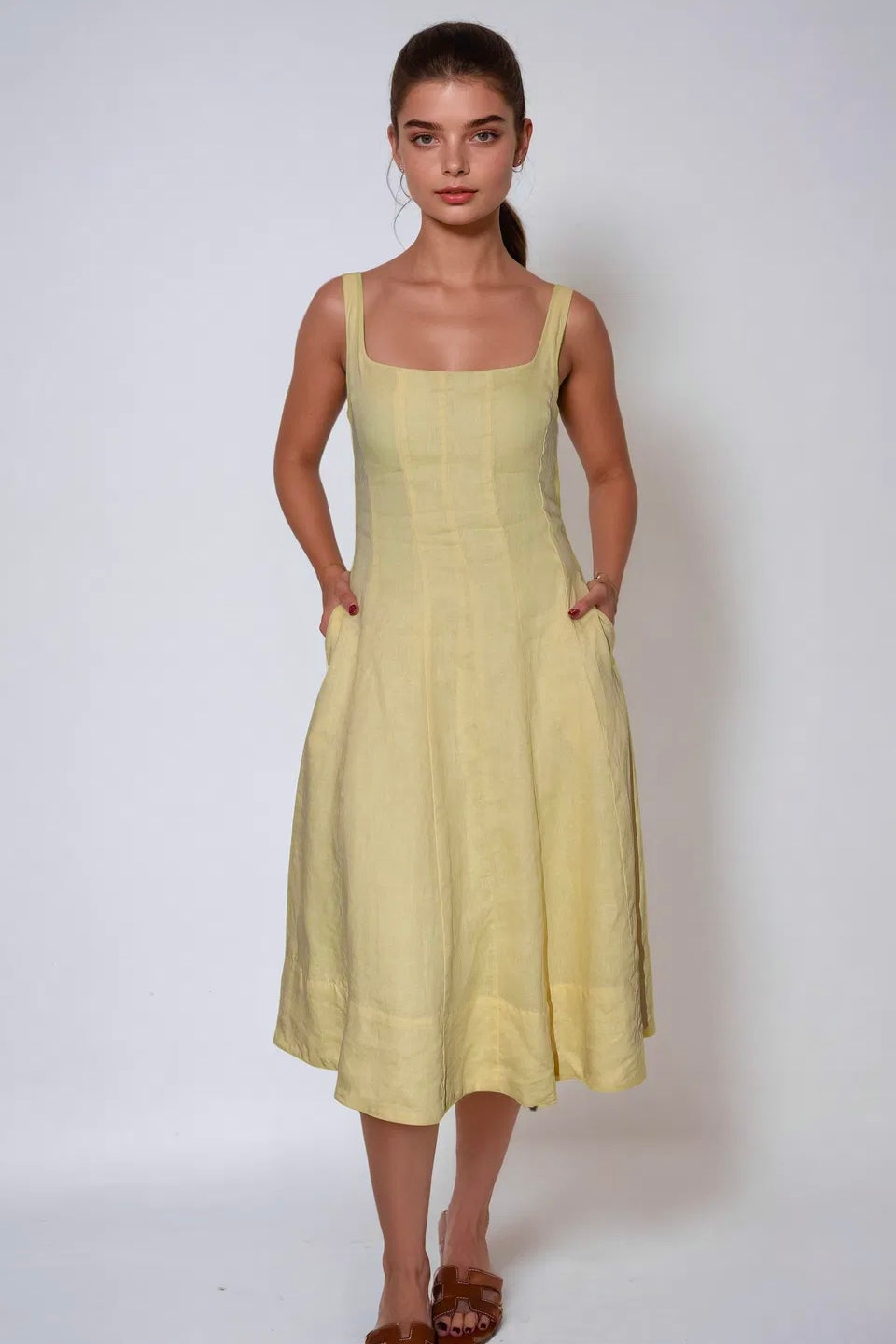 100% recycled linen and lined with soft recycled polyester, A-line midi silhouette and elegant panelling
